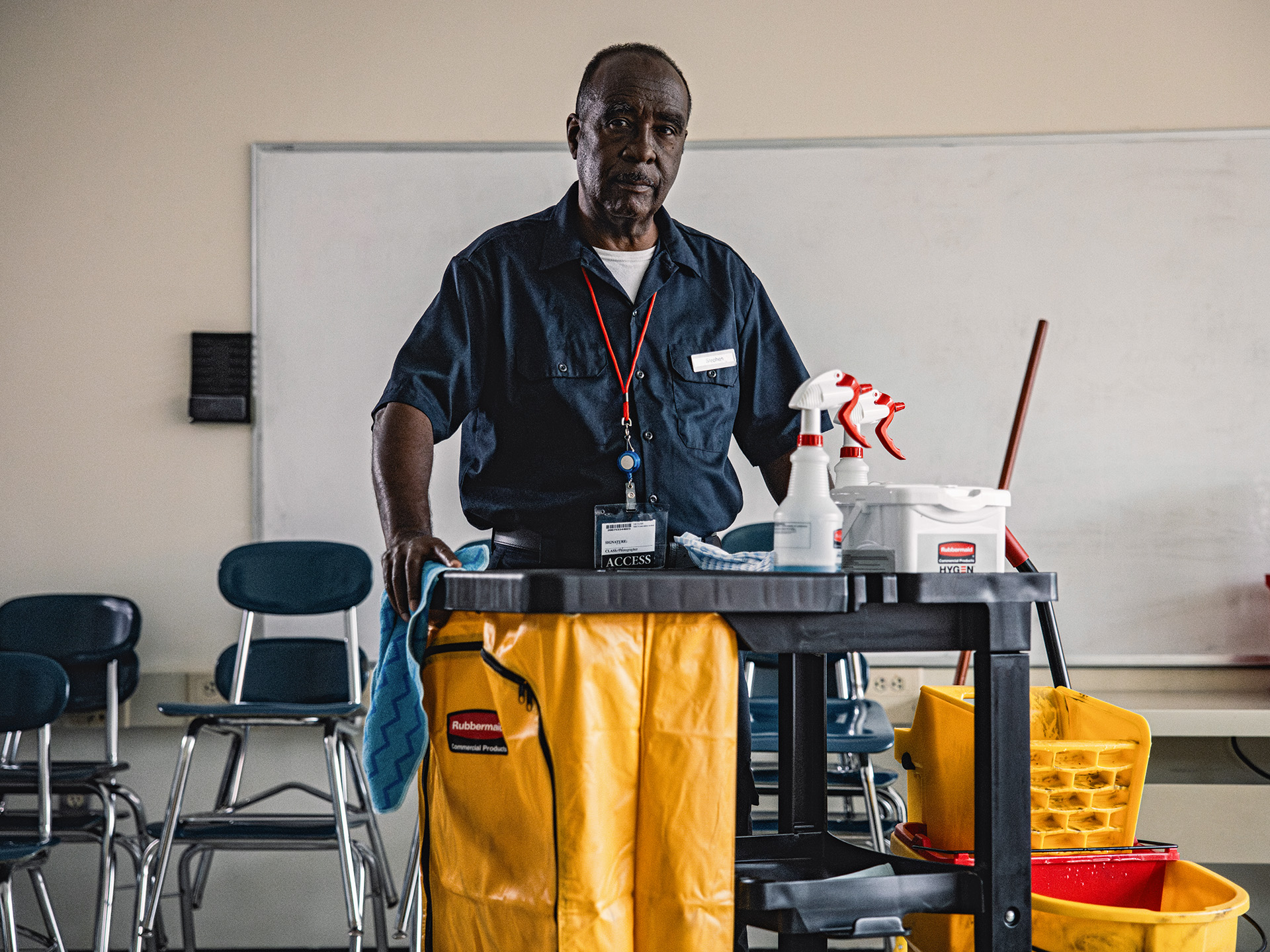 Man with janitor cart.